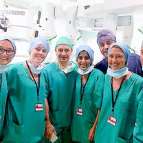 Shadowing in the hospital Students and hospital staff in scrubs